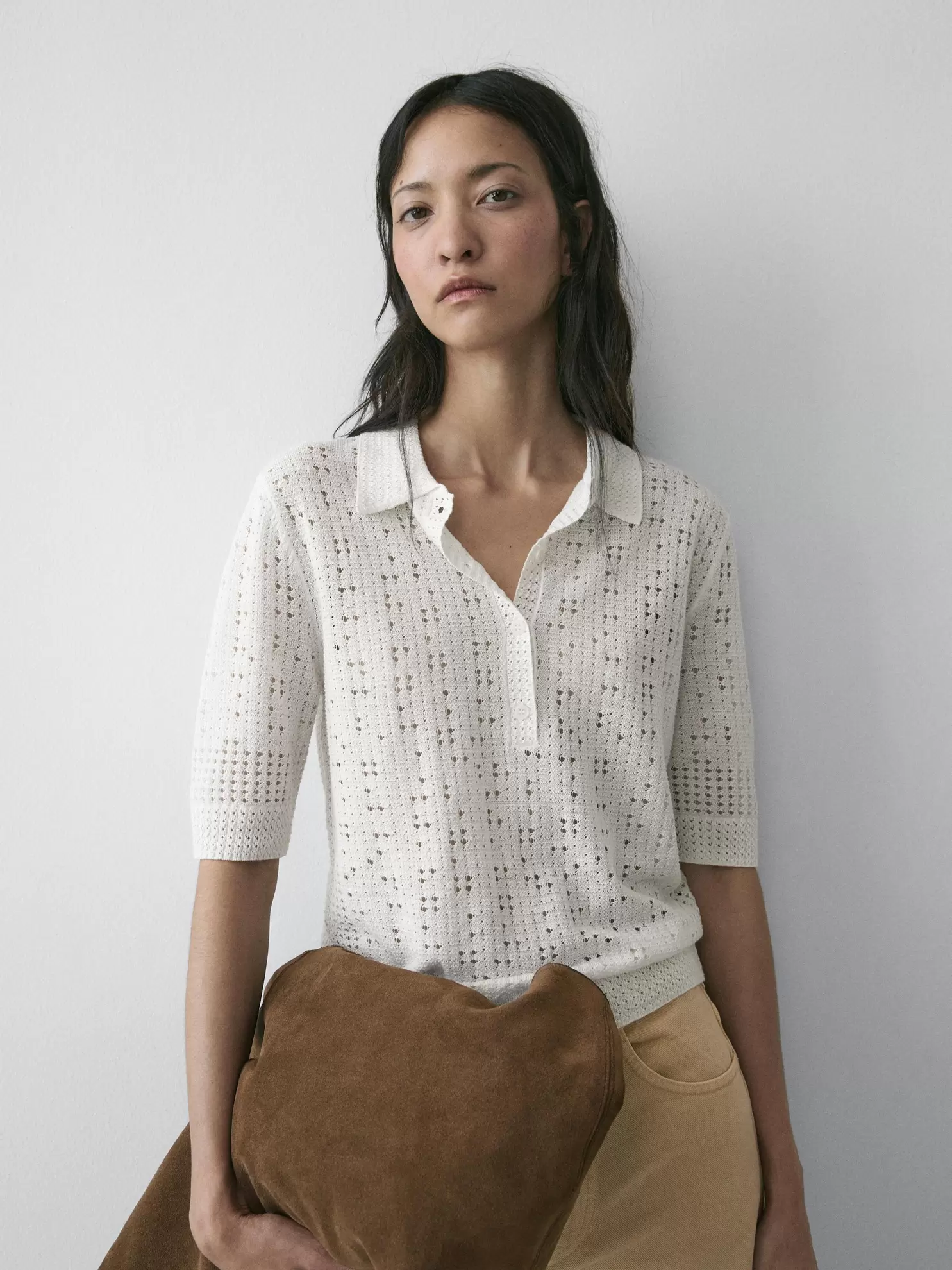 Knit sweater with a polo collar