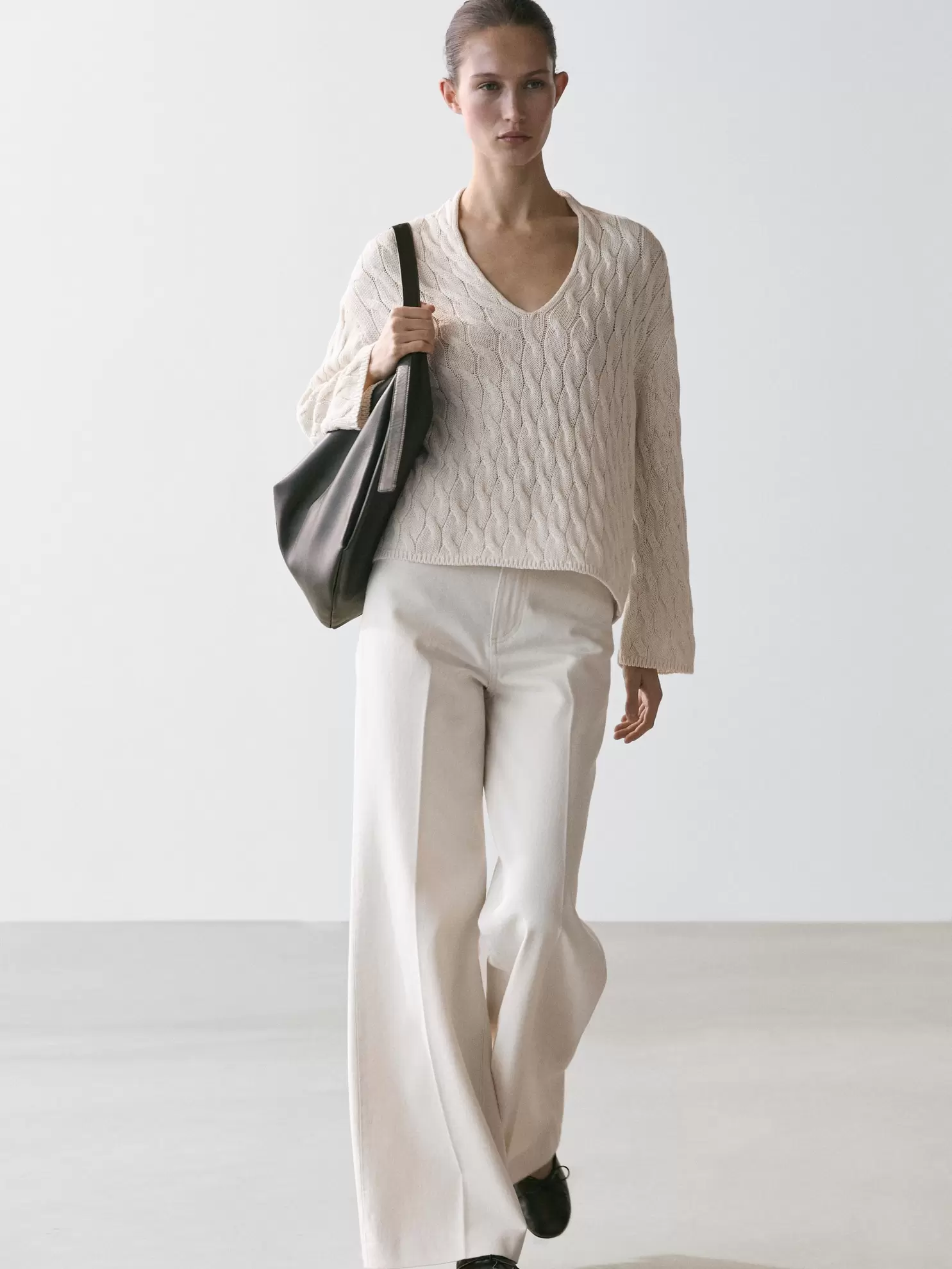 Cotton blend knit sweater with knot details