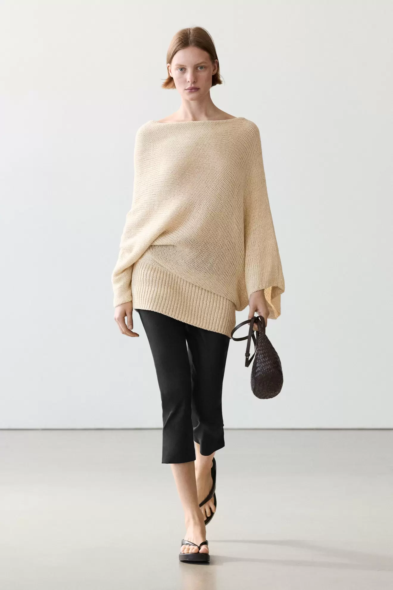 Oversize cotton and linen sweater with draped neck