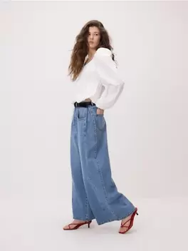 Blugi wide leg cu pliuri