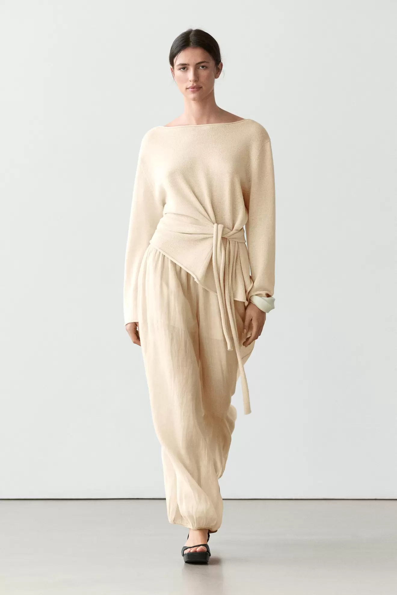 Asymmetric linen blend sweater with tie detail