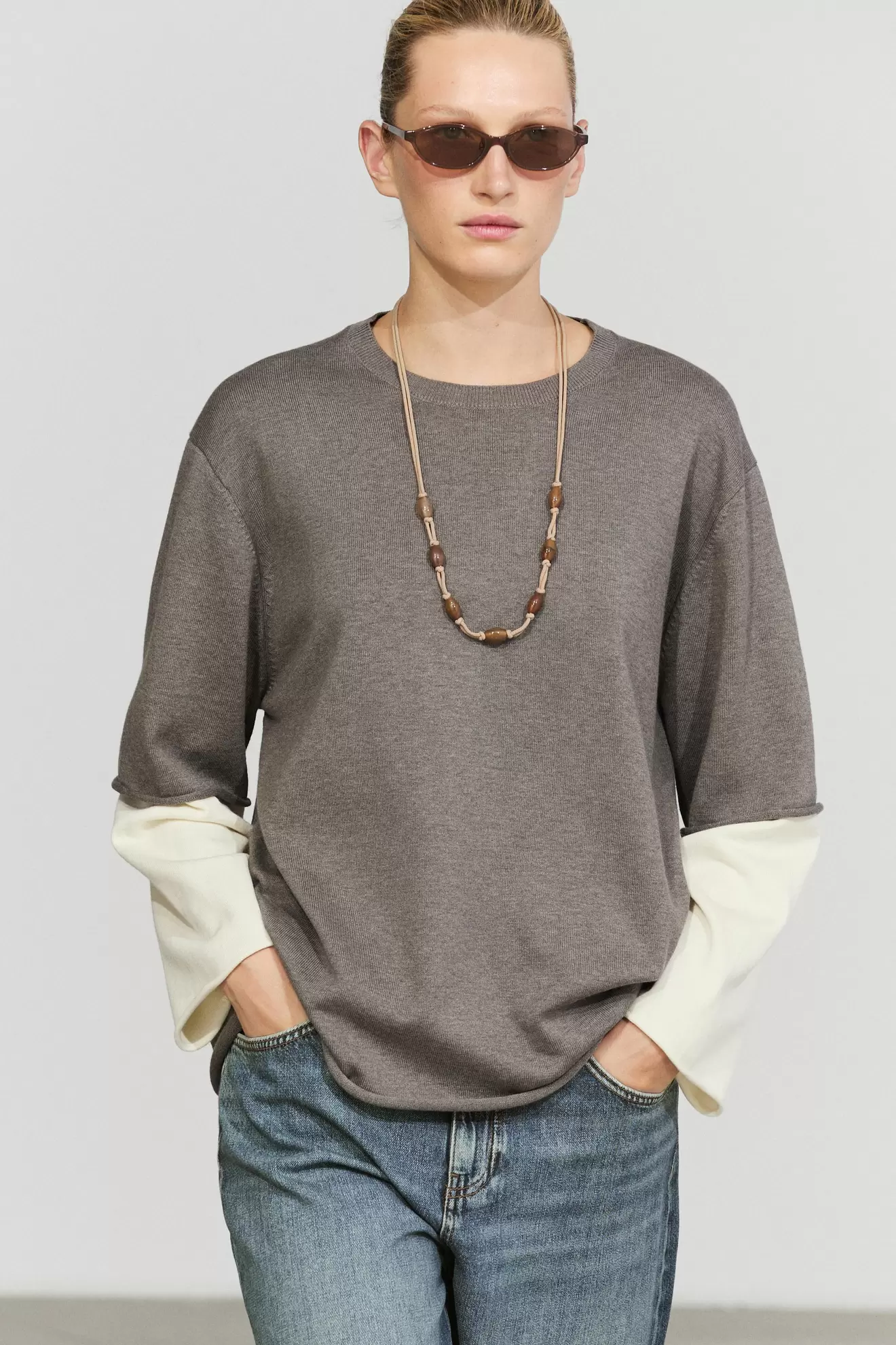 Oversize knit sweater with double sleeve detail
