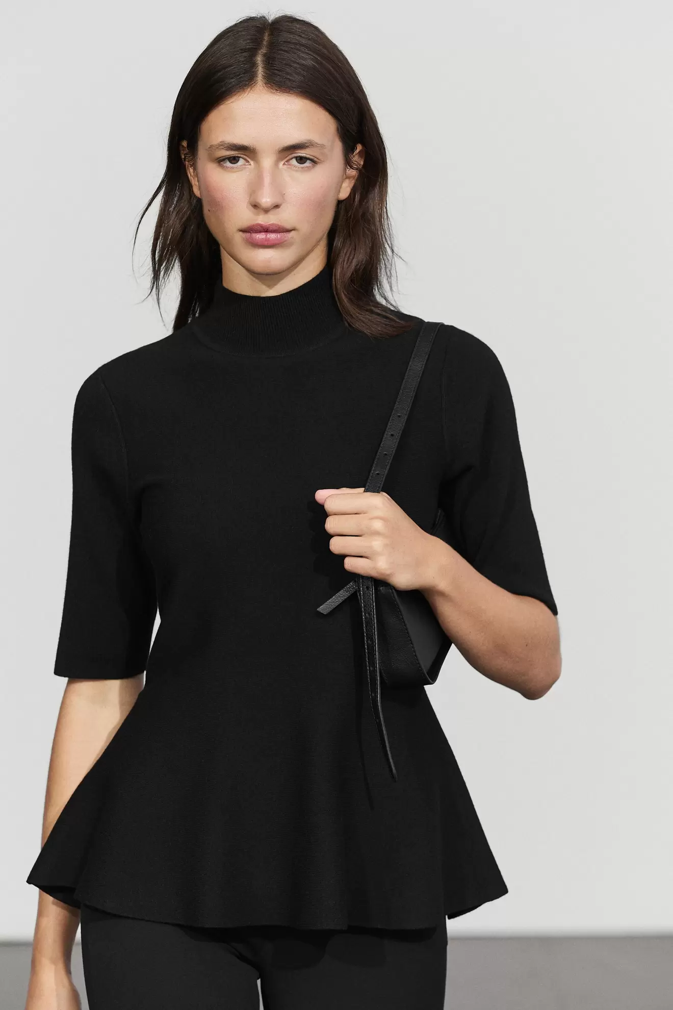 Peplum detail knit top