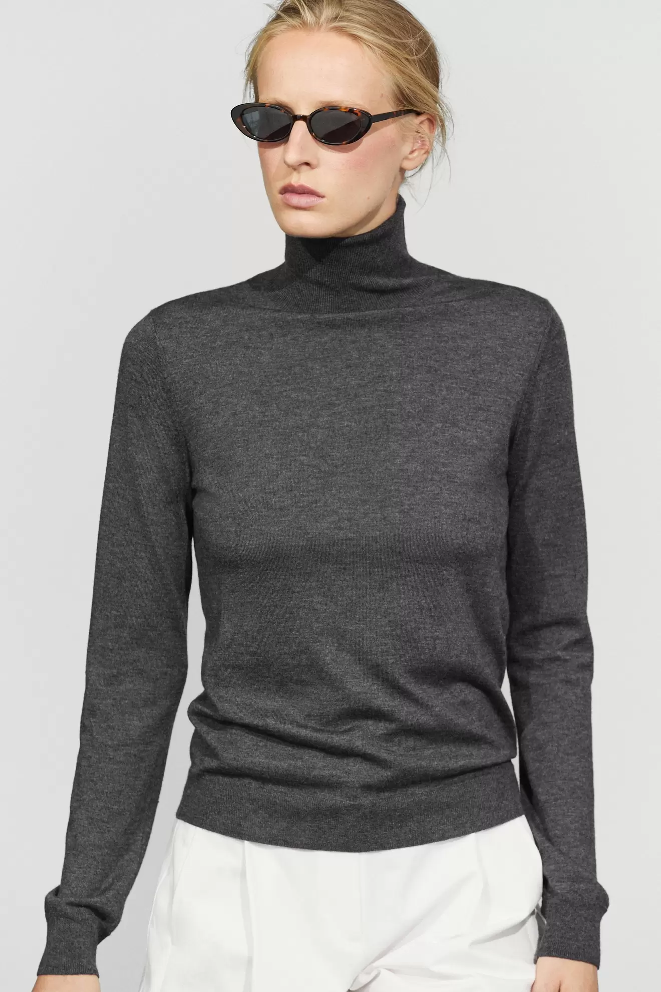 Wool-blend turtleneck knit sweater