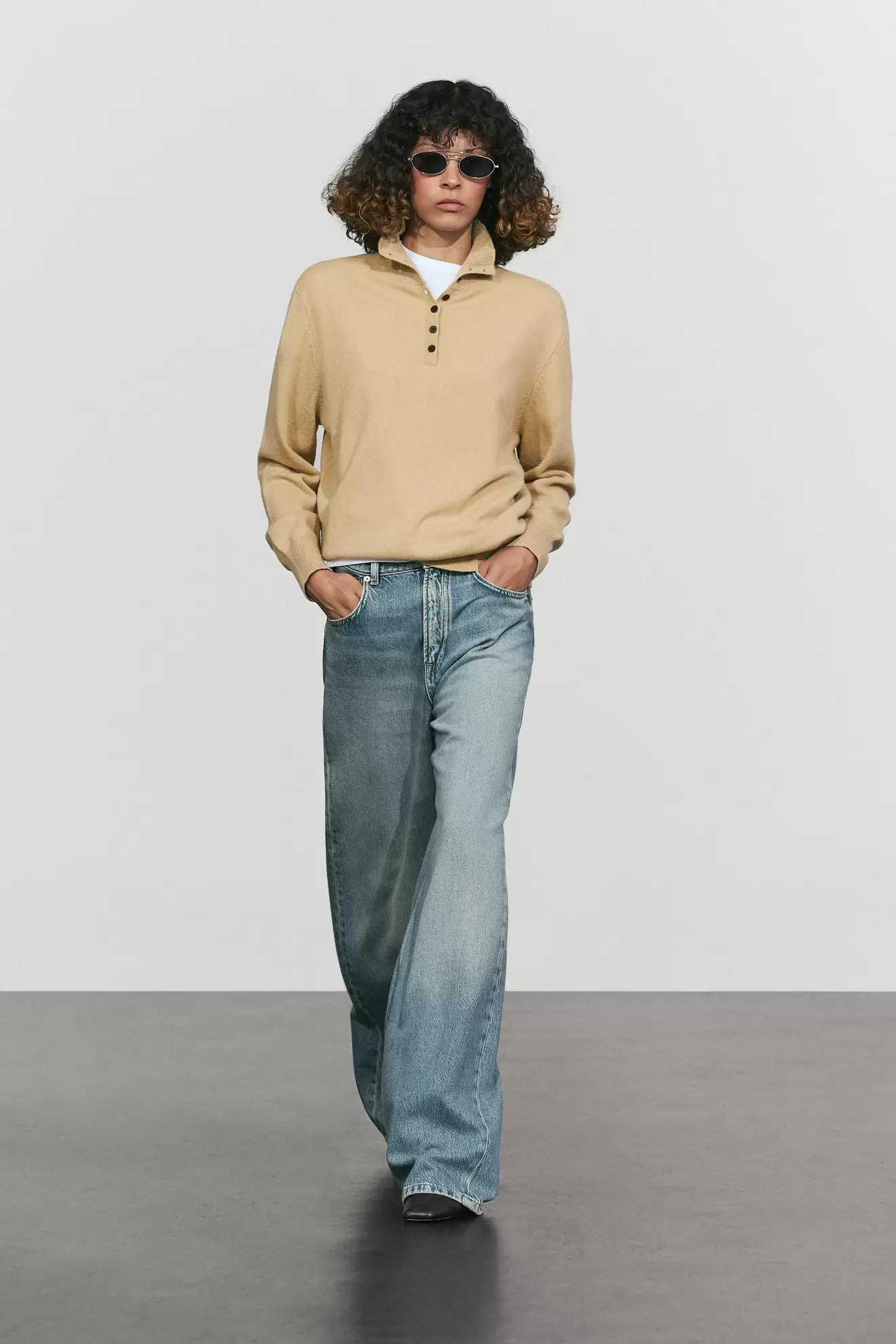 High neck knit sweater with button detail