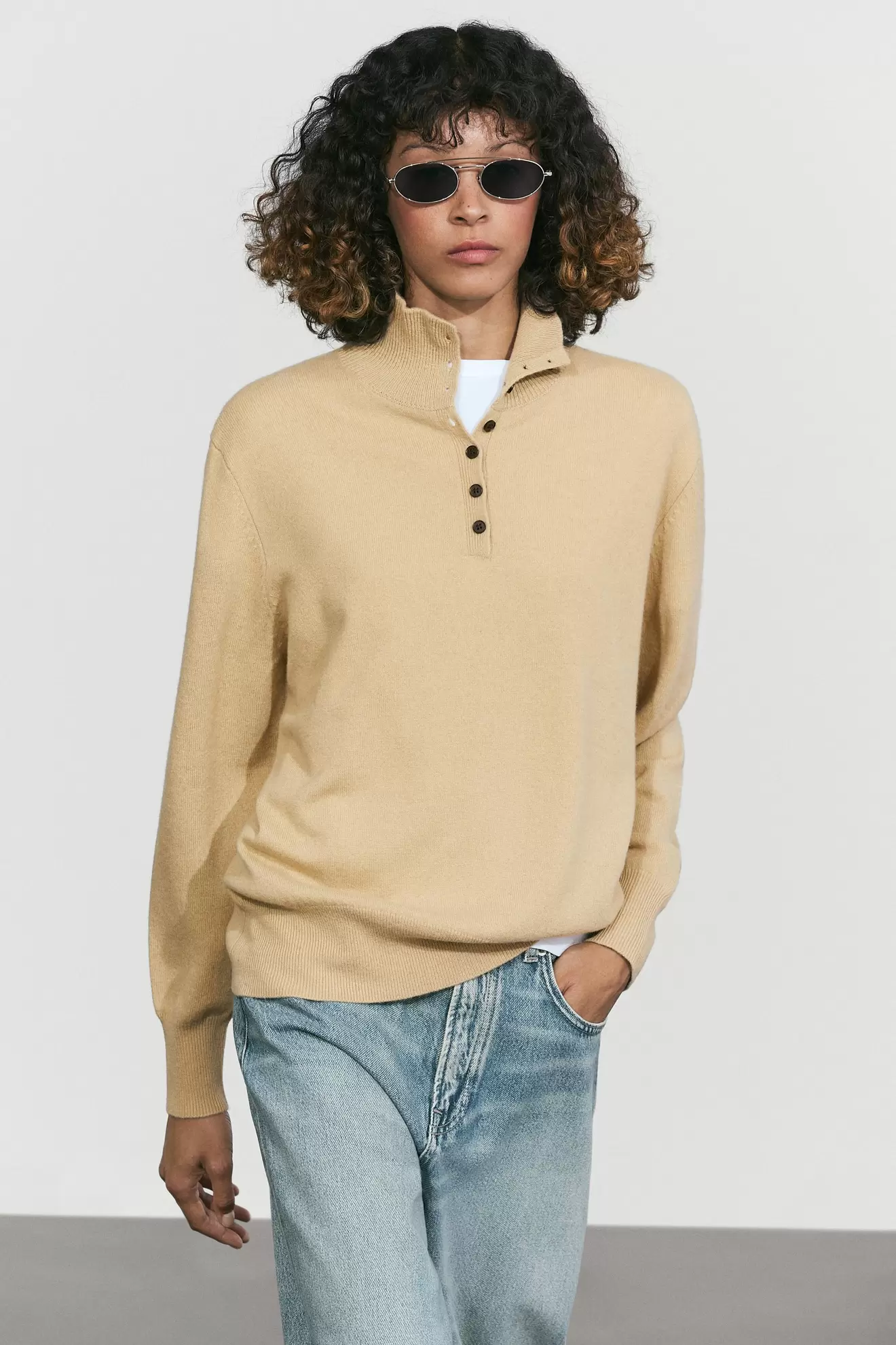 High neck knit sweater with button detail