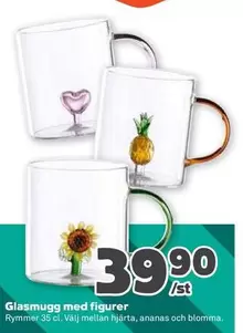 Glasmugg med figurer