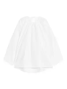 Blus med öppen rygg