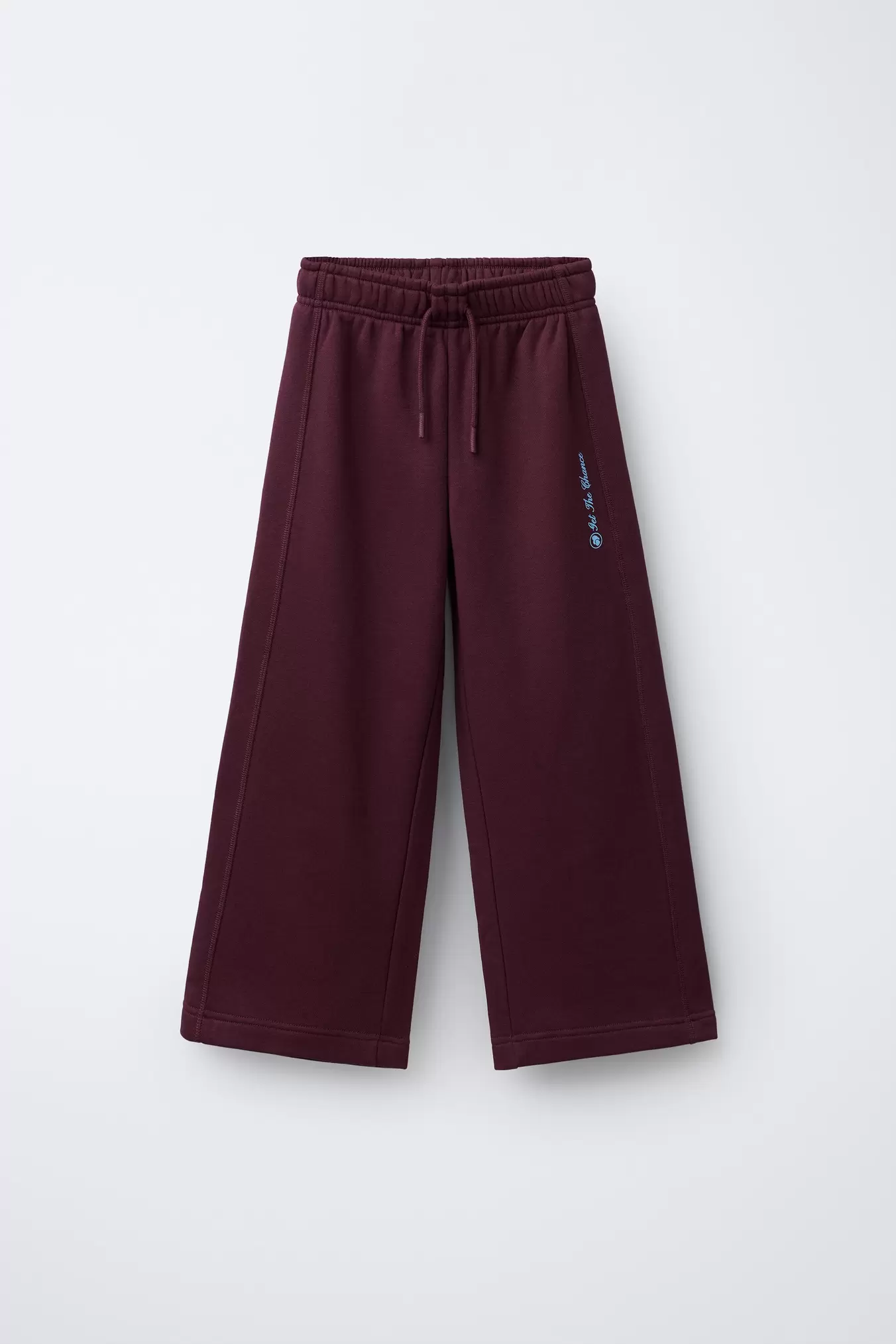 WIDE-LEG TEXT TROUSERS
