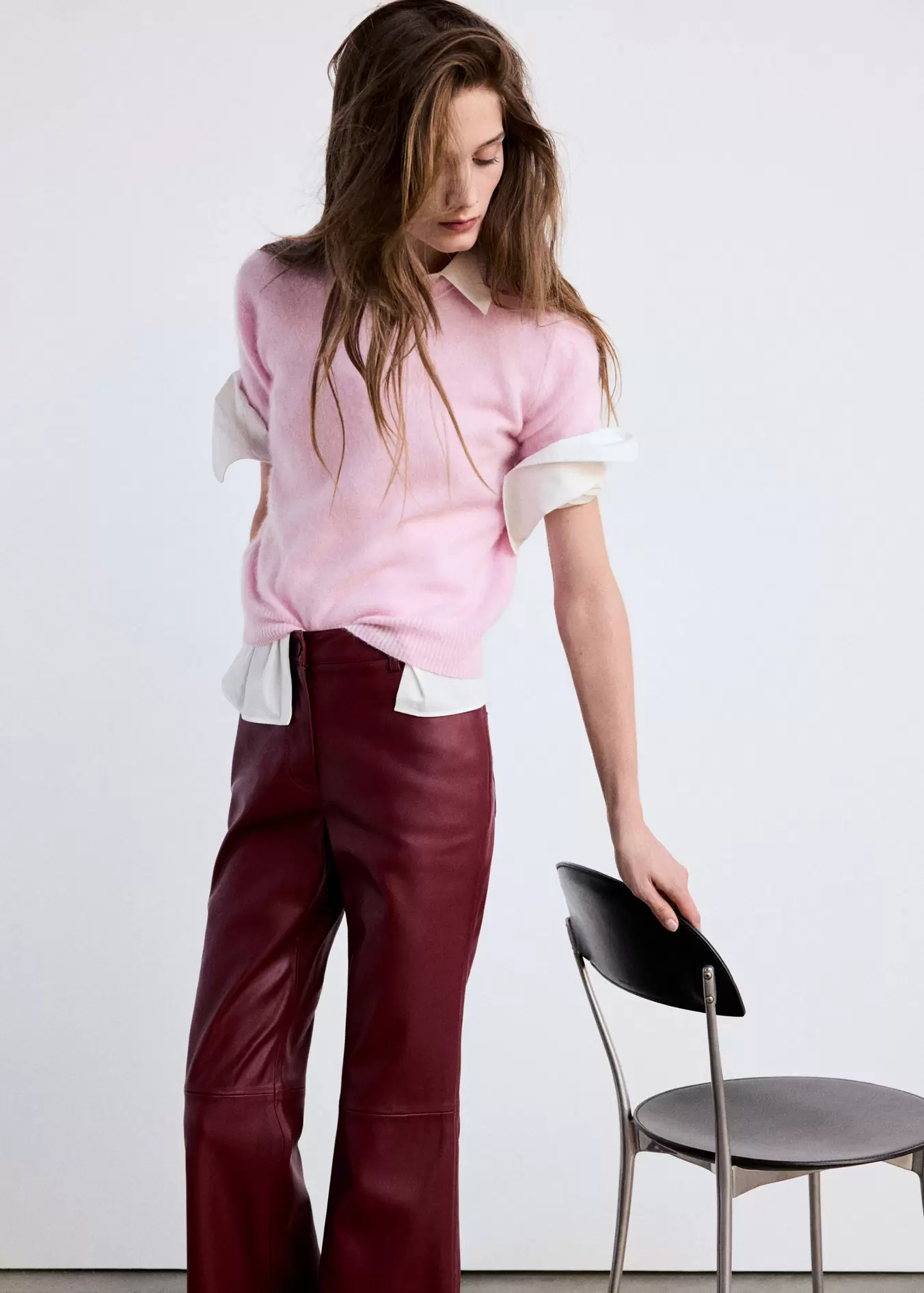 Faux-leather flared trousers