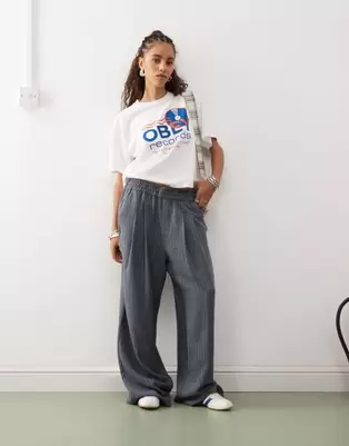 COLLUSION relaxed pull on trouser in navy stripe