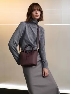 Beryl Recycled Leather Double-Handle Belted Bucket Bag - wineberry red